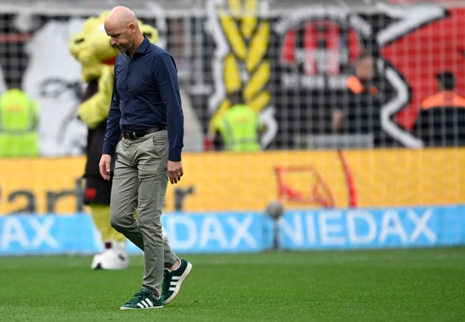 Bayer Leverkusen's Dutch head coach Erik ten Hag reacts after the German first division Bundesliga football match between Bayer 04 Leverkusen and TSG 1899 Hoffenheim in Leverkusen, western Germany on August 23, 2025. (AFP)