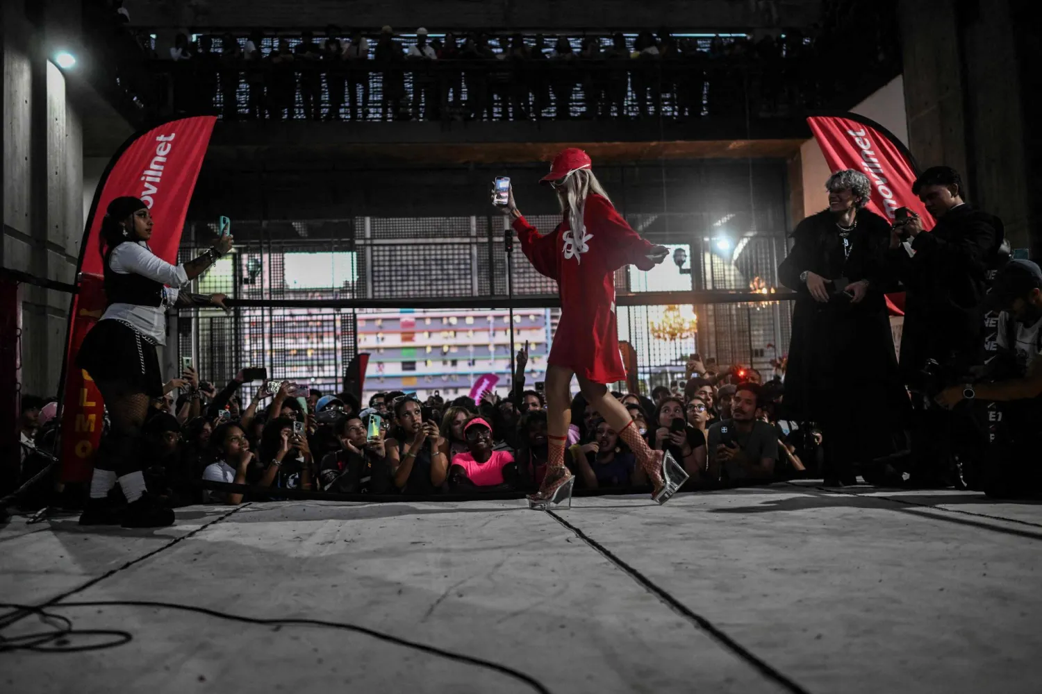 A model presents her outfit as she competes for the best clothing style during the 'Battle of Outfits' in Caracas on August 23, 2024. (Photo by Juan BARRETO / AFP)