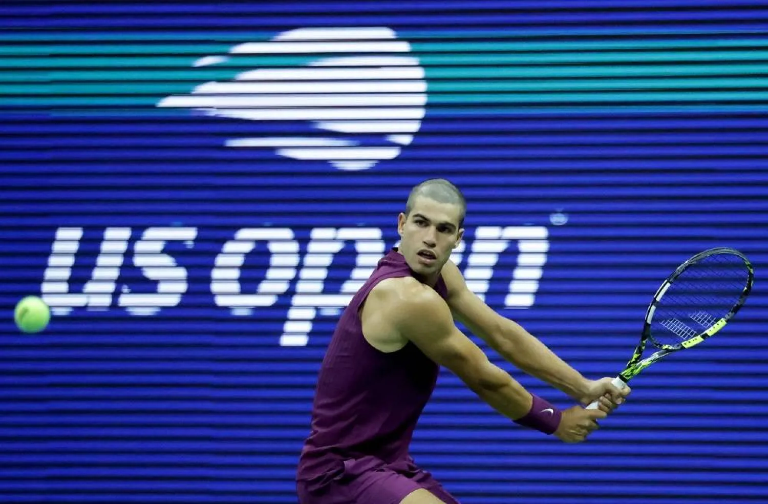Tennis - US Open - Flushing Meadows, New York, United States - August 25, 2025 Spain's Carlos Alcaraz in action during his first round match against Reilly Opelka of the US. (Reuters)