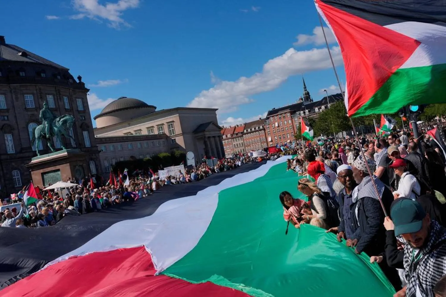 People participate in a demonstration called, "All of Denmark on the streets for a free Palestine", in support of Palestinian in Gaza, amid the ongoing conflict between Israel and Hamas, in the streets of Copenhagen, Denmark August 24, 2025. (Ritzau Scanpix/Emil Helms via Reuters) 