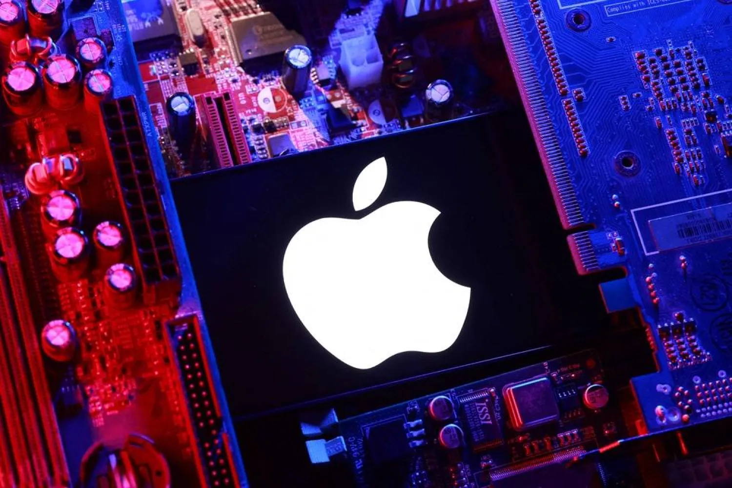 An Apple logo and a computer motherboard appear in this illustration taken August 25, 2025. (Reuters) 