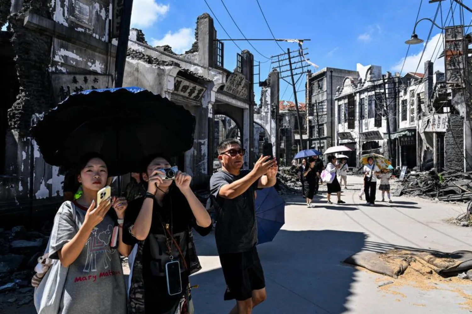 China has no film rating system, and it is not uncommon for children to watch content that might be considered overly violent elsewhere. Hector RETAMAL / AFP
