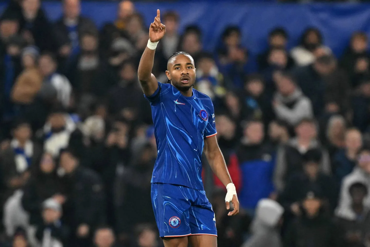 (FILES) Chelsea's French striker #18 Christopher Nkunku celebrates scoring the team's seventh goal during the UEFA Europa Conference League, League Stage football match between Chelsea and FC Noah at Stamford Bridge in London on November 7, 2024. (Photo by Glyn KIRK / AFP)
