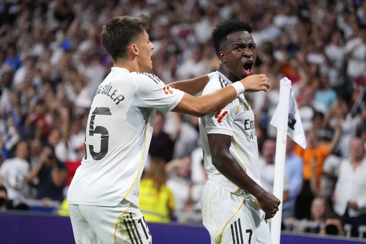  Real Madrid's Vinicius Junior, right, celebrates with Arda Güler after scoring his side's second goal during the Spanish La Liga soccer match between Real Madrid and Mallorca in Madrid, Saturday, Aug. 30, 2025. (AP) 