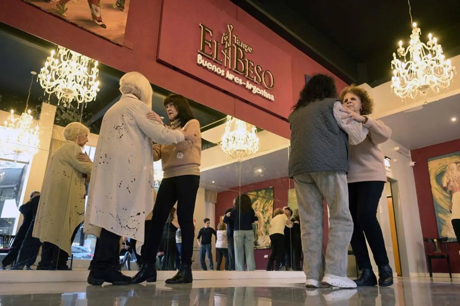 Women suffering from Parkinson's disease dance during a tango therapy session in Buenos Aires on August 26, 2025. (AFP) 