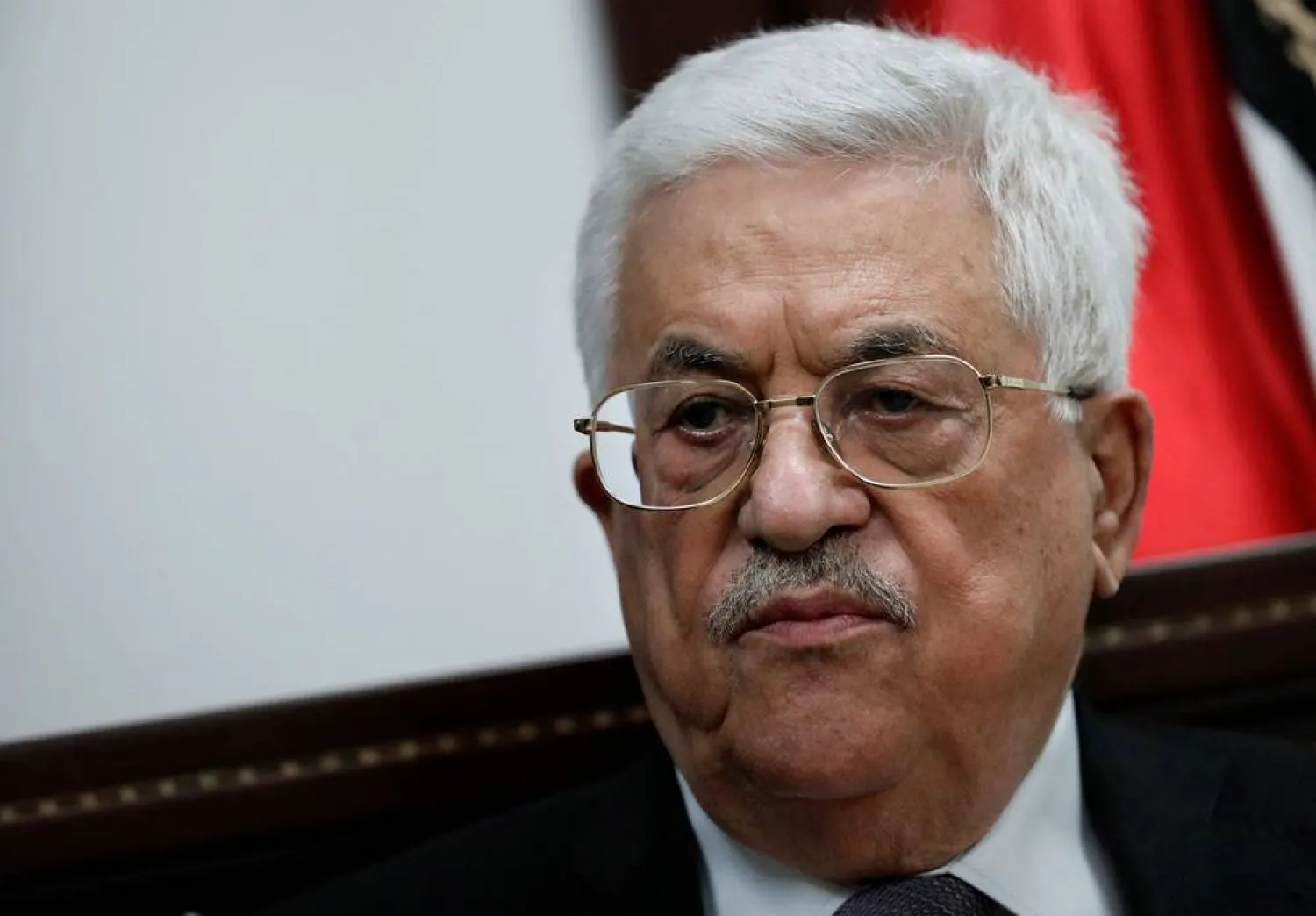 In this file photo taken on April 11, 2016, Palestinian President Mahmoud Abbas reacts during an exclusive interview with AFP reporters in his office in the West Bank city of Ramallah. (AFP)