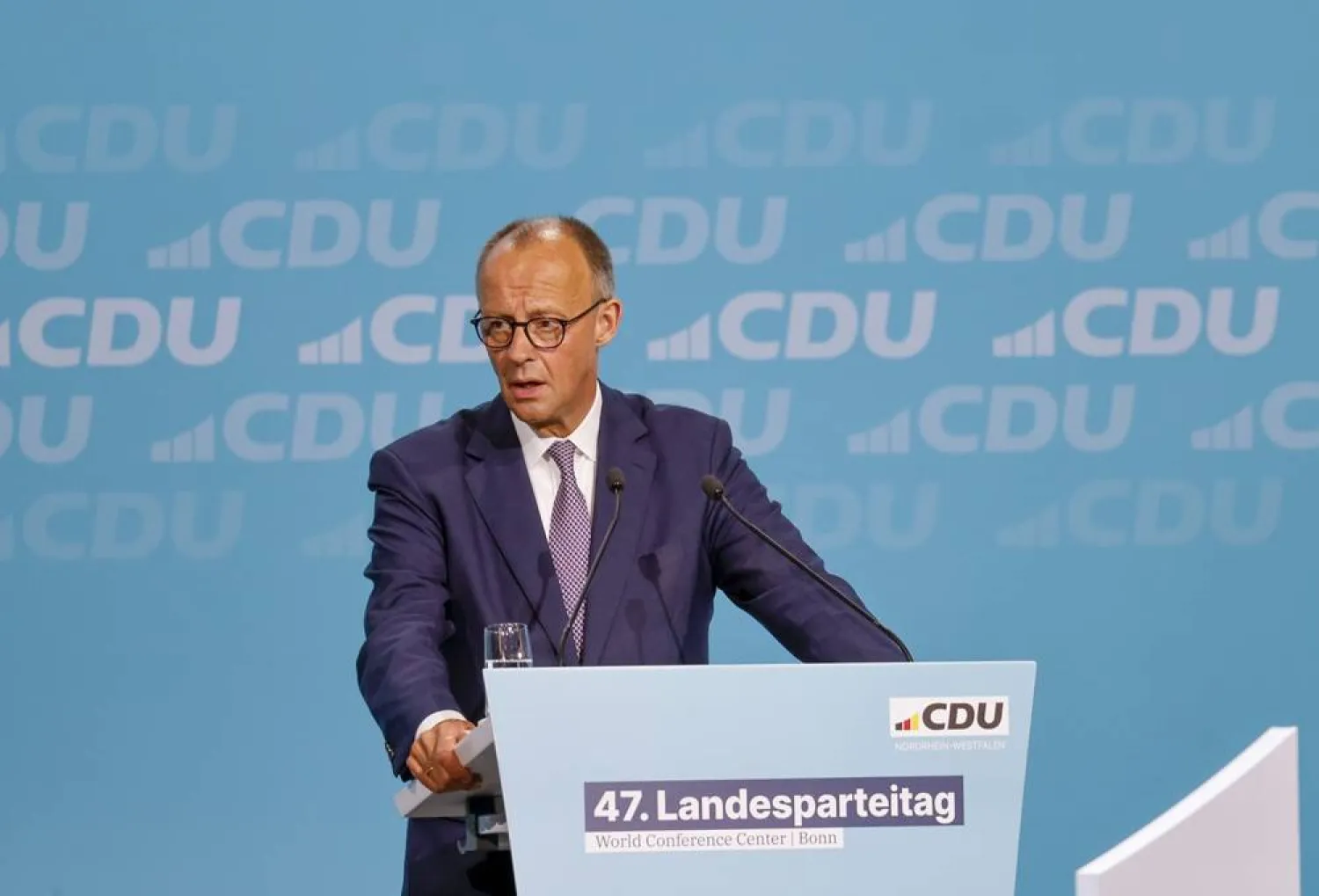  30 August 2025, North Rhine-Westphalia, Bonn: German Chancellor Friedrich Merz speaks at the state party conference of the Christian Democratic Union (CDU) North Rhine-Westphalia. (dpa)