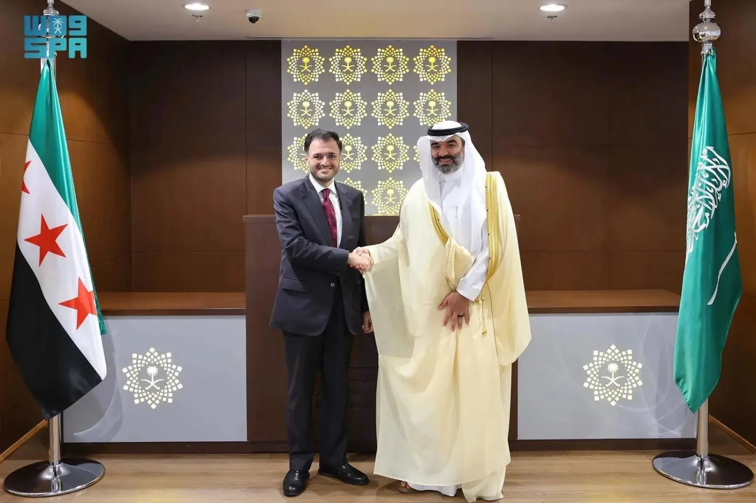 Saudi Minister of Communications and Information Technology Abdullah Alswaha and his Syrian counterpart Abdulsalam Haykal meet in Riyadh on Sunday. (SPA)