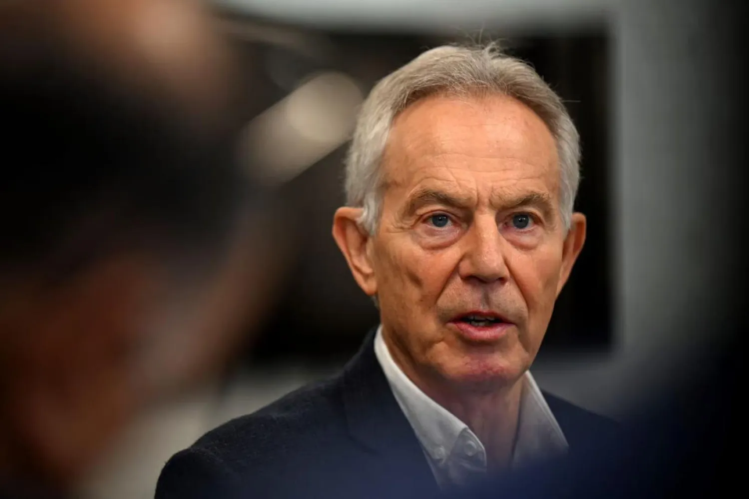 Tony Blair, 2003'te Irak'ın ABD öncülüğündeki koalisyon güçleri tarafından işgaline verdiği destekle tepki toplamıştı (AFP)