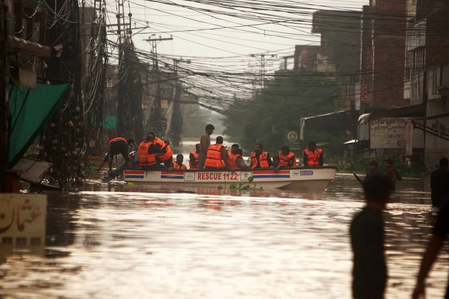 Rescue officials evacuate people affected by floods in Lahore, Punjab province, Pakistan, 31 August 2025 (issued 01 September 2025). (EPA)