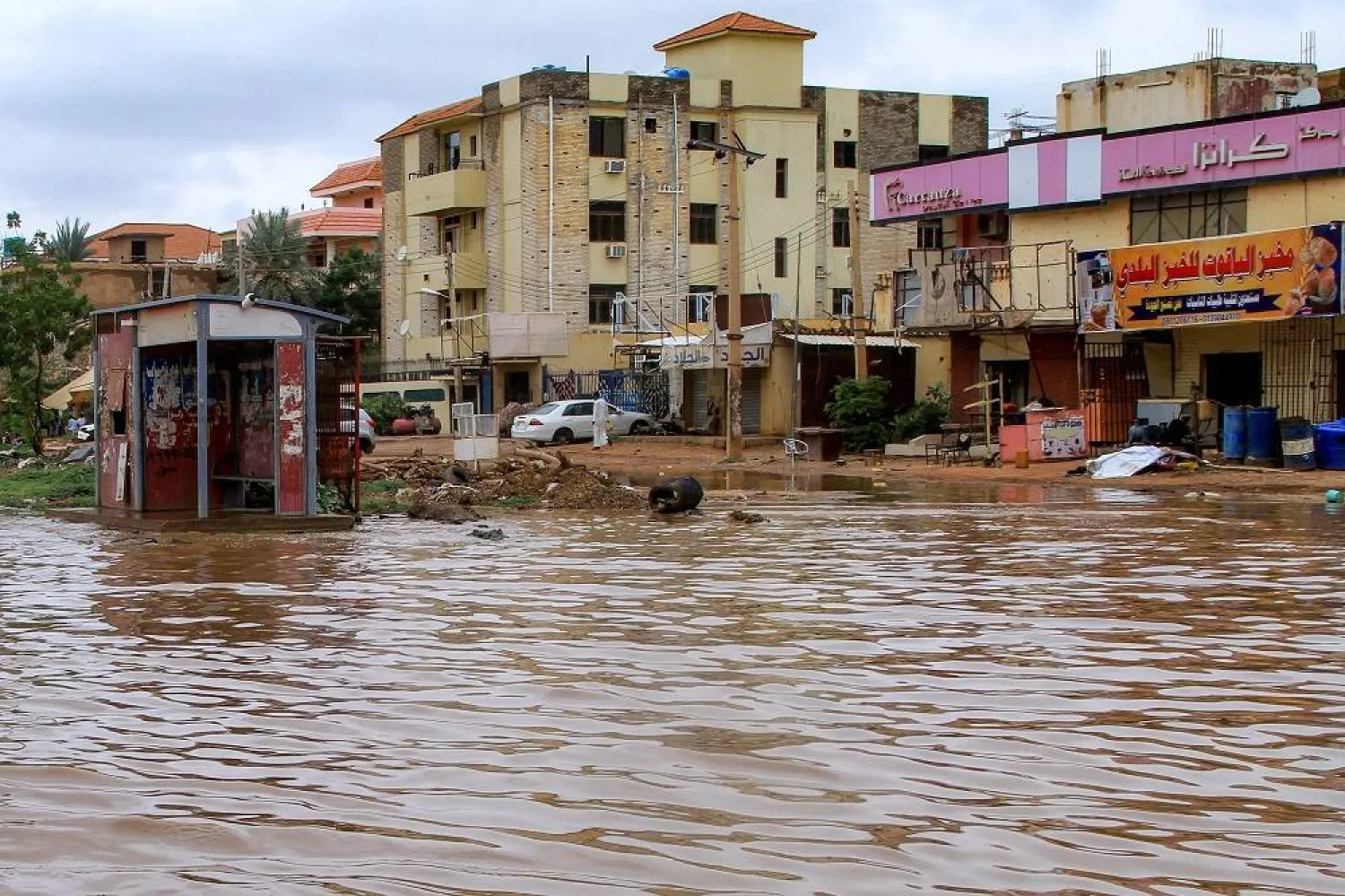 Flood water inundates a main street in Sudan's capital Khartoum following heavy rain on August 27, 2025. (AFP)