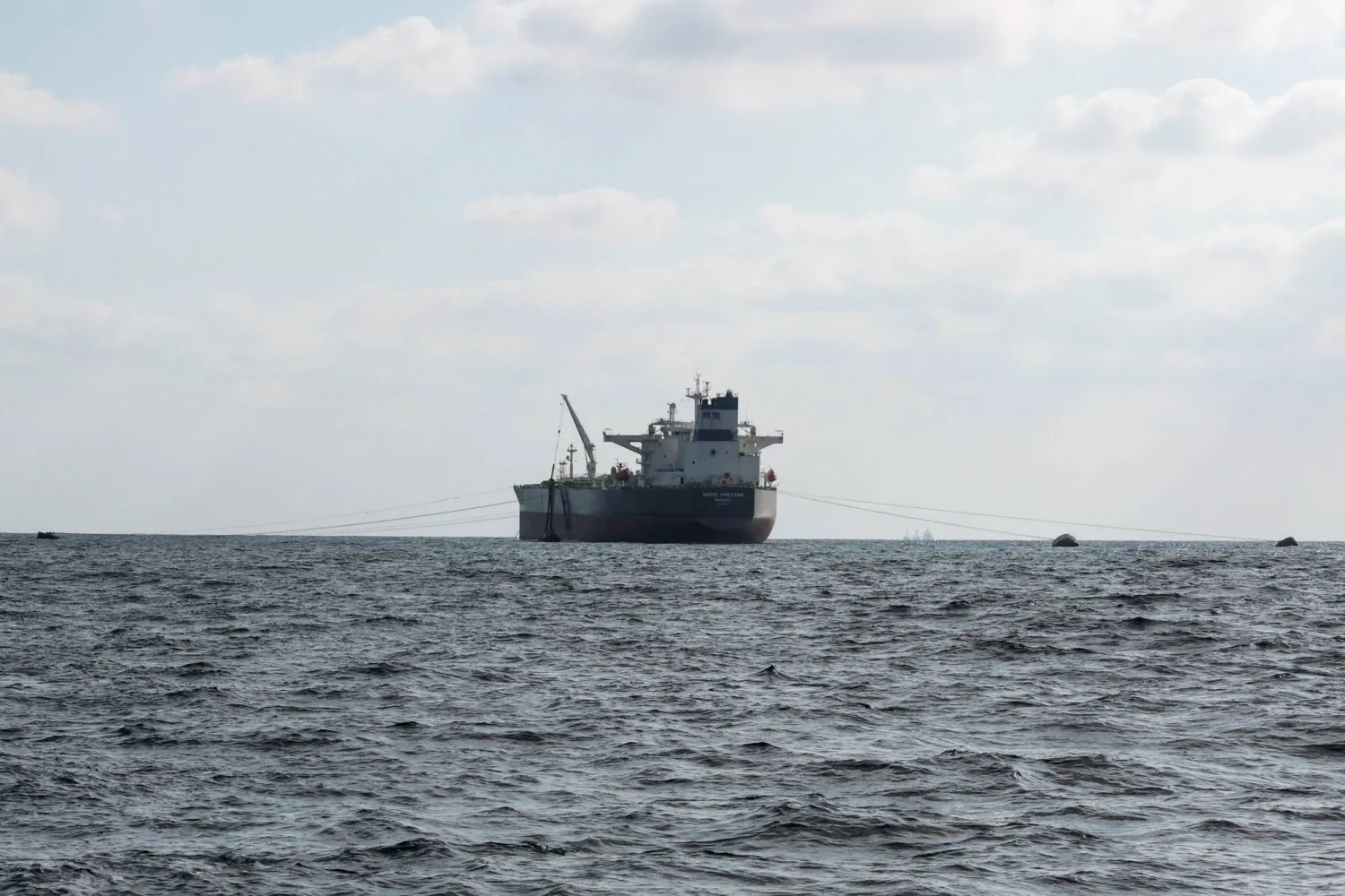 Crude oil tanker Nissos Christiana, first ship to transport oil from Syria since the fall of Bashar al-Assad’s regime, is anchored in the port of Tartus, Syria, September 1, 2025. REUTERS/Mahmoud Hassano