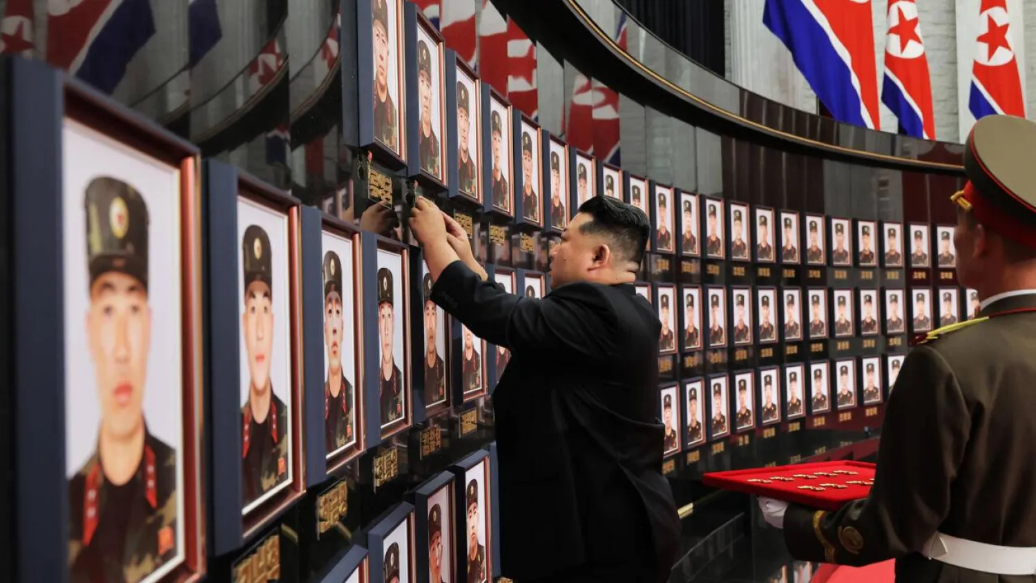 North Korean leader Kim Jong Un visits a memorial wall in Pyongyang in August for Korean People's Army's Overseas Operational Forces who took part in military operations for Russia. STR / KCNA VIA KNS/AFP/File
