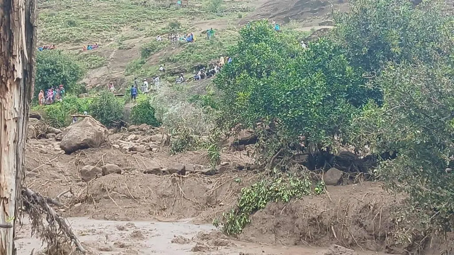 People gather at an area following a landslide that destroyed the Tarseen village, in the Marra Mountains area of Sudan September 1, 2025. (Sudan Liberation Movement/Army/Handout via Reuters) 