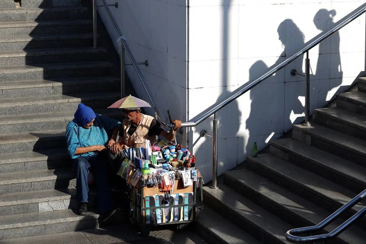 A street vendor waits for customers in the Eminonu shopping district in Istanbul, Türkiye, August 29, 2025. (Reuters)