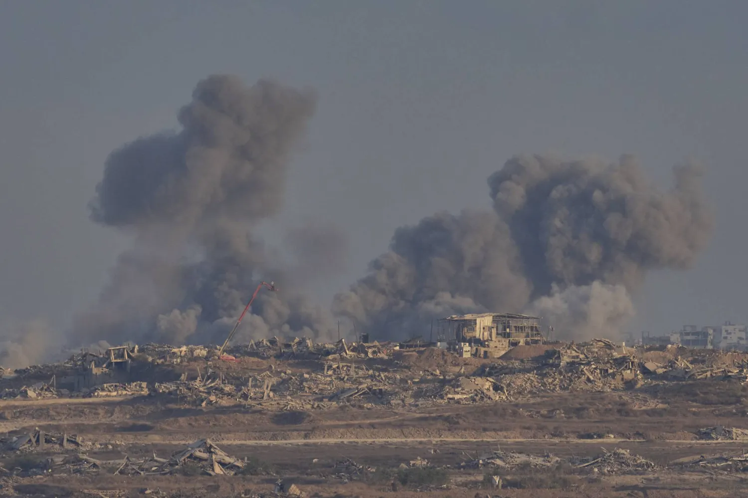 Smoke rises following an explosion in the Gaza Strip, as seen from southern Israel, Tuesday, Sept. 2, 2025. (AP Photo/Ohad Zwigenberg)