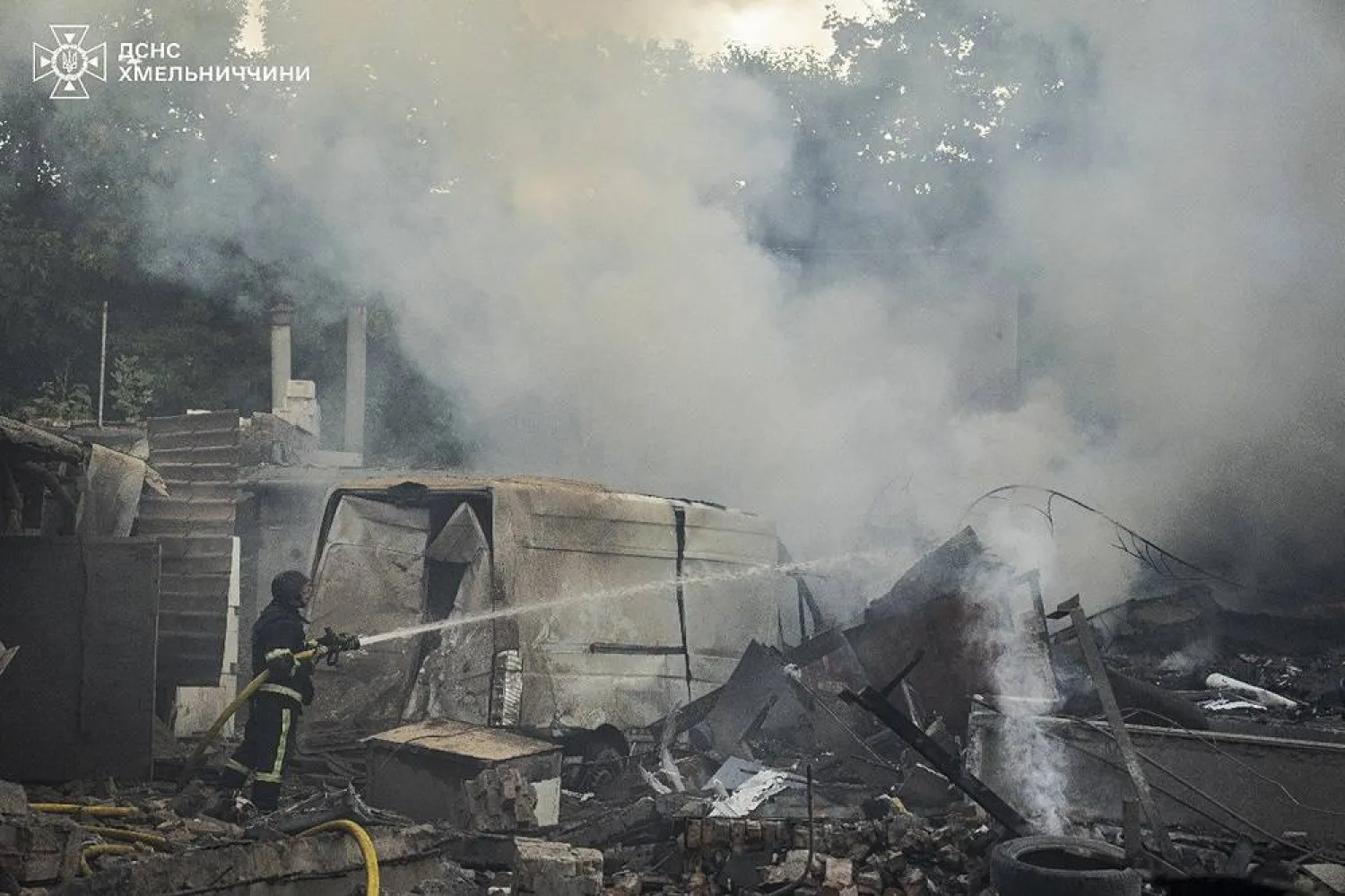  A handout photo made available by the State Emergency Service shows Ukrainian rescuers work at the site of Russian shelling in the Khmelnytskyi region of Ukraine, 03 September 2025, amid the ongoing Russian invasion. (EPA/State Emergency Service/Handout)