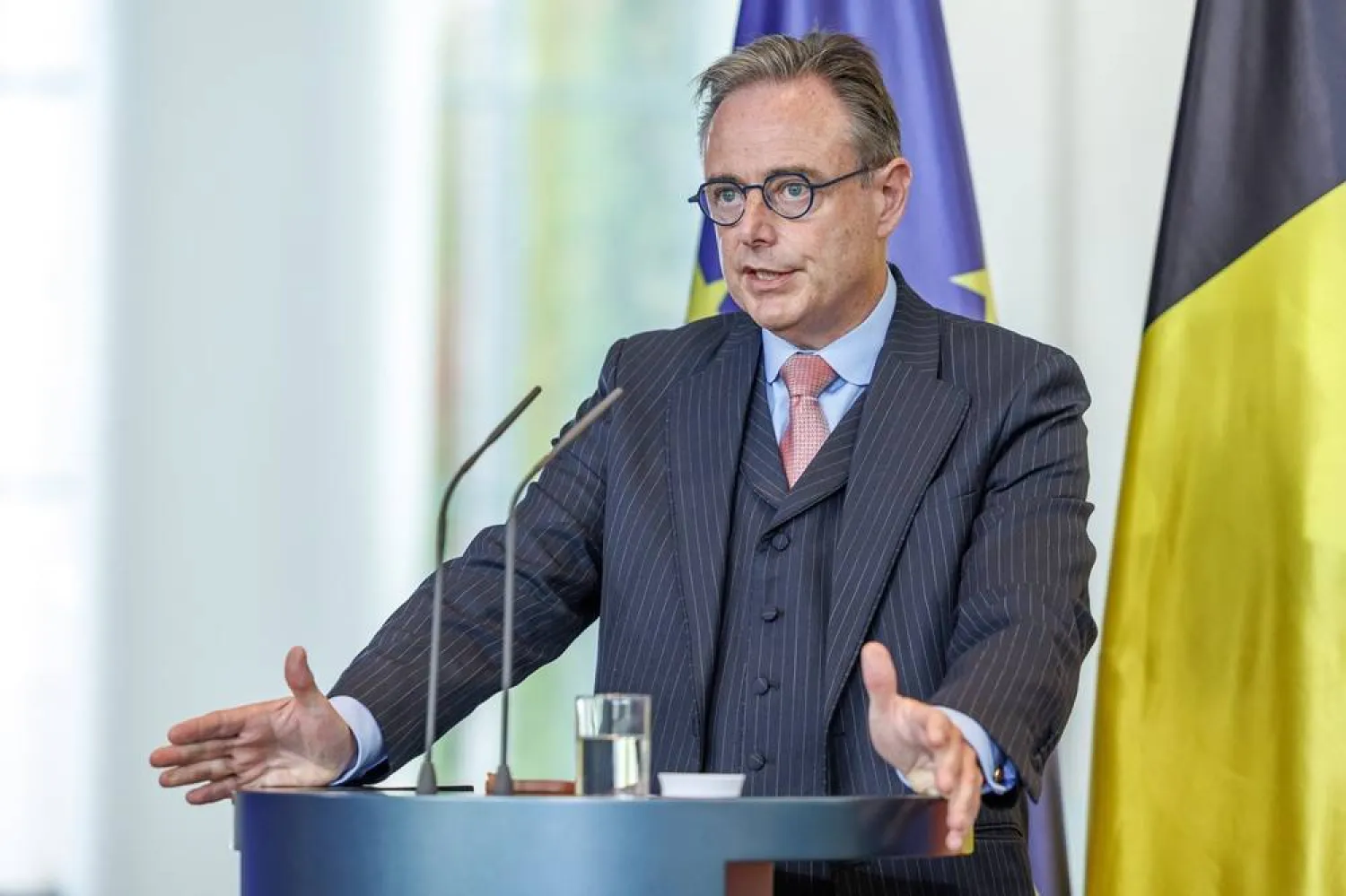 Belgian Prime Minister Bart De Wever speaks during a press conference with German Chancellor Friedrich Merz (not pictured) at the Federal Chancellery in Berlin, 26 August 2025. (EPA)