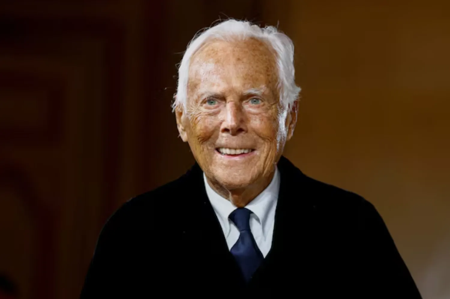 Designer Giorgio Armani appears at the end of his Haute Couture Spring/Summer 2025 collection show for Giorgio Armani Prive in Paris, France, January 28, 2025. REUTERS/Sarah Meyssonnier/File Photo 