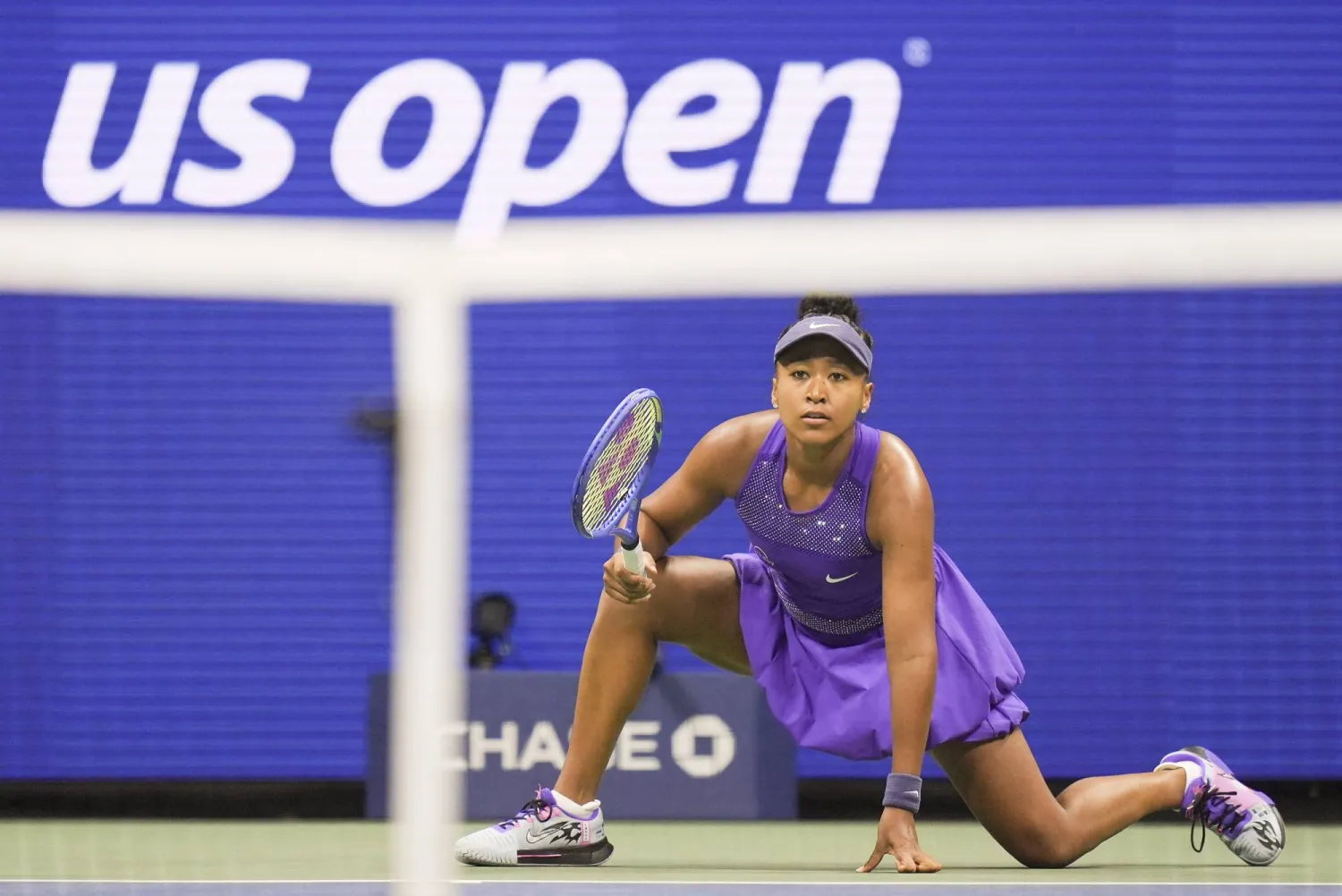 Naomi Osaka, of Japan, watches a return to Amanda Anisimova, of the United States, during the women's singles semifinals of the US Open tennis championships, Friday, Sept. 5, 2025, in New York. (AP Photo/Seth Wenig)