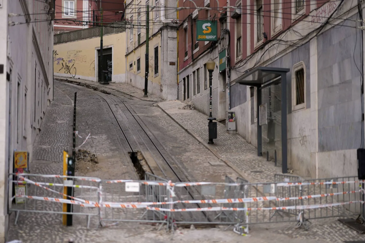 View of the site where a tourist streetcar derailed and crashed in Lisbon, Portugal, Friday, Sept. 5, 2025. (AP Photo/Armando Franca)