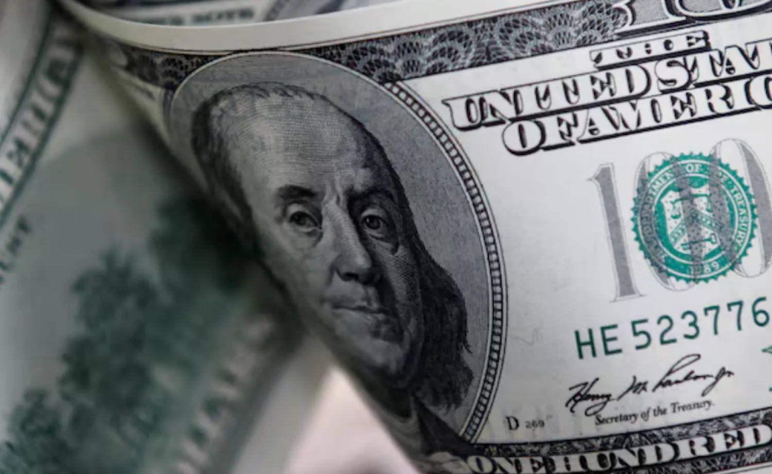 US one hundred dollar notes are seen in this picture illustration taken in Seoul February 7, 2011. REUTERS/Lee Jae-Won/File Photo 