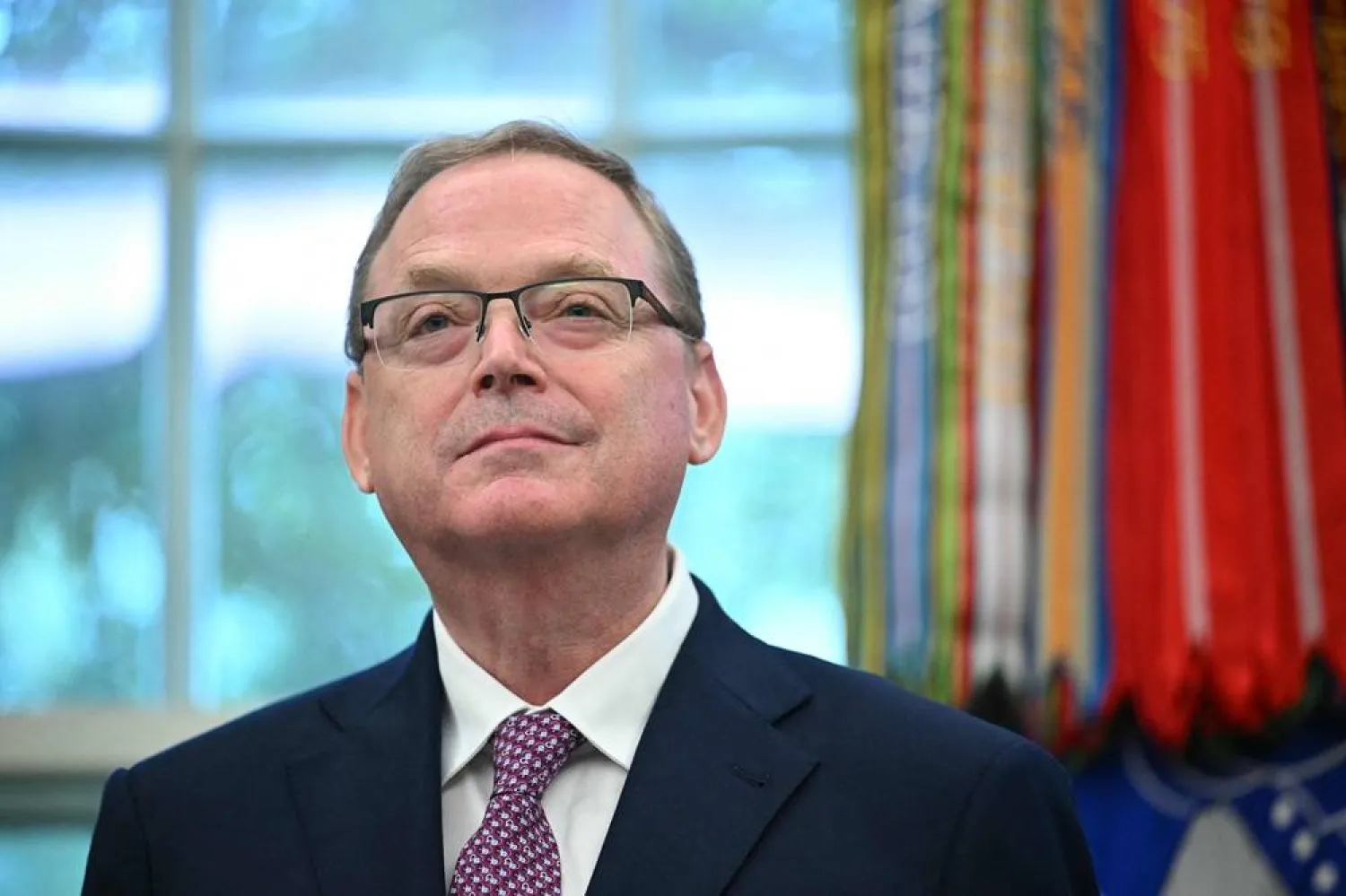  Director of the National Economic Council Kevin Hassett looks on as US President Donald Trump signs executive orders in the Oval Office of the White House in Washington, DC on September 5, 2025. (AFP) 