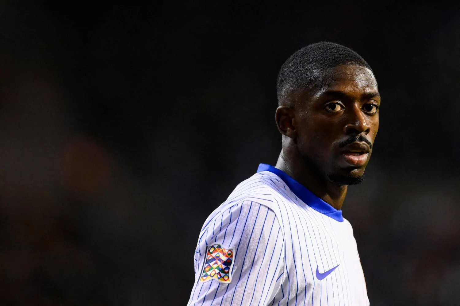 (FILES) France's midfielder #07 Ousmane Dembele looks on during the UEFA Nations League League A, Group A2 football match between Belgium and France, at the King Baudouin Stadium in Brussels, on October 14, 2024. (Photo by JOHN THYS / AFP)