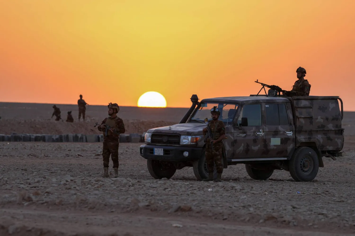 Iraqi army troops are seen on patrol on September 2, 2025. (Photo by Qassem al-KAABI / AFP)
