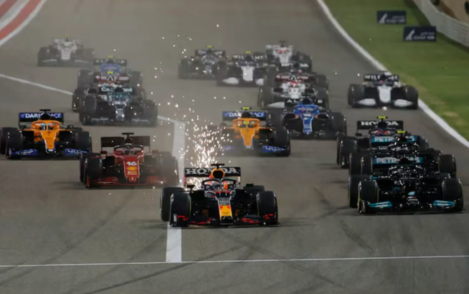 Formula One F1 - Bahrain Grand Prix - Bahrain International Circuit, Sakhir, Bahrain - March 28, 2021 Red Bull's Max Verstappen leads at the start of the race REUTERS/Hamad I Mohammed 