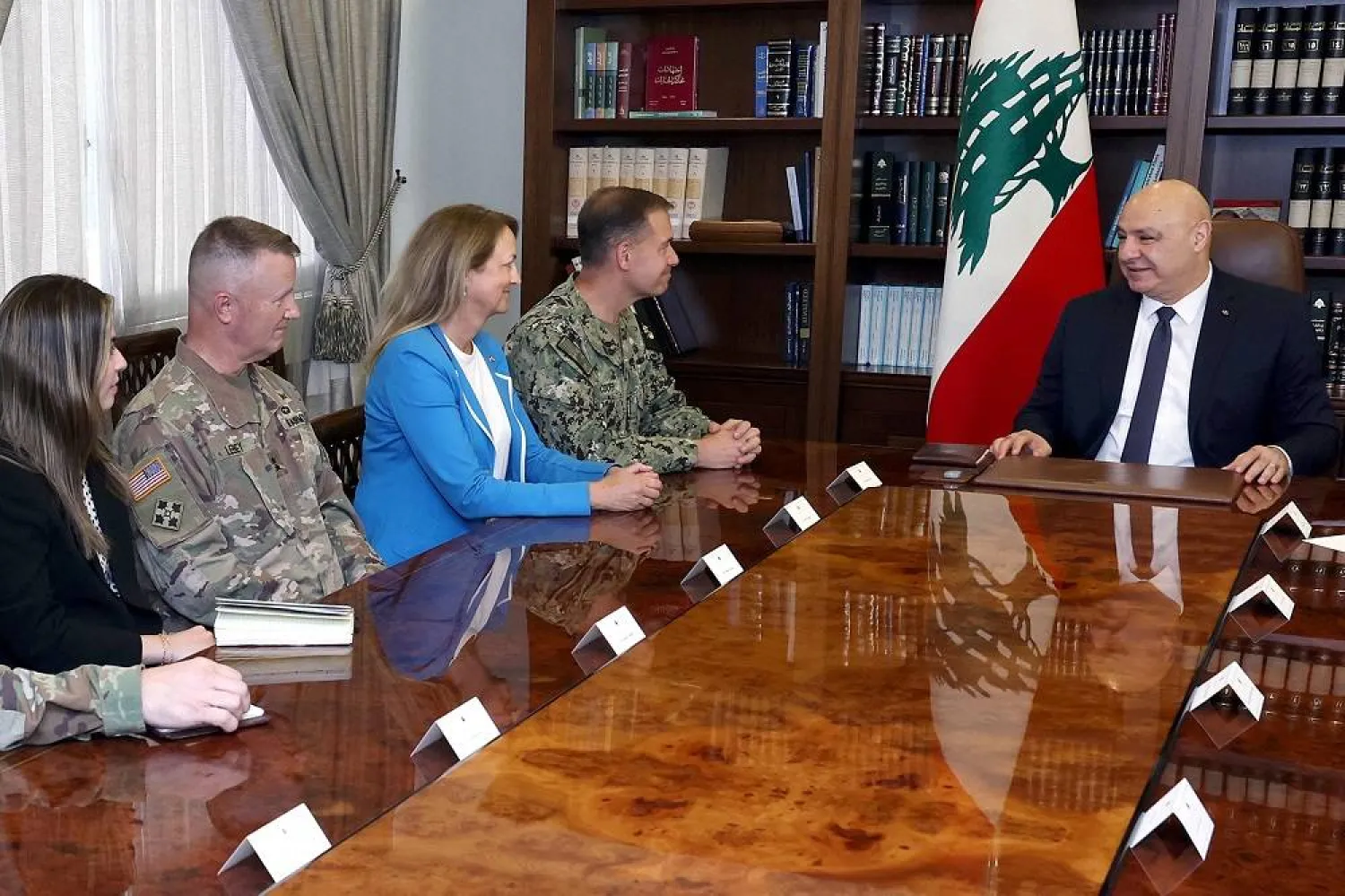 This handout photo released by the Lebanese Presidency press office on September 6, 2025, shows Lebanon's President Joseph Aoun (R) receiving US Navy Admiral Brad Cooper (C), Commander of the US Central Command (CENTCOM), at the presidential palace in Baabda on September 6, 2025. (Lebanese Presidency / AFP / Handout)  