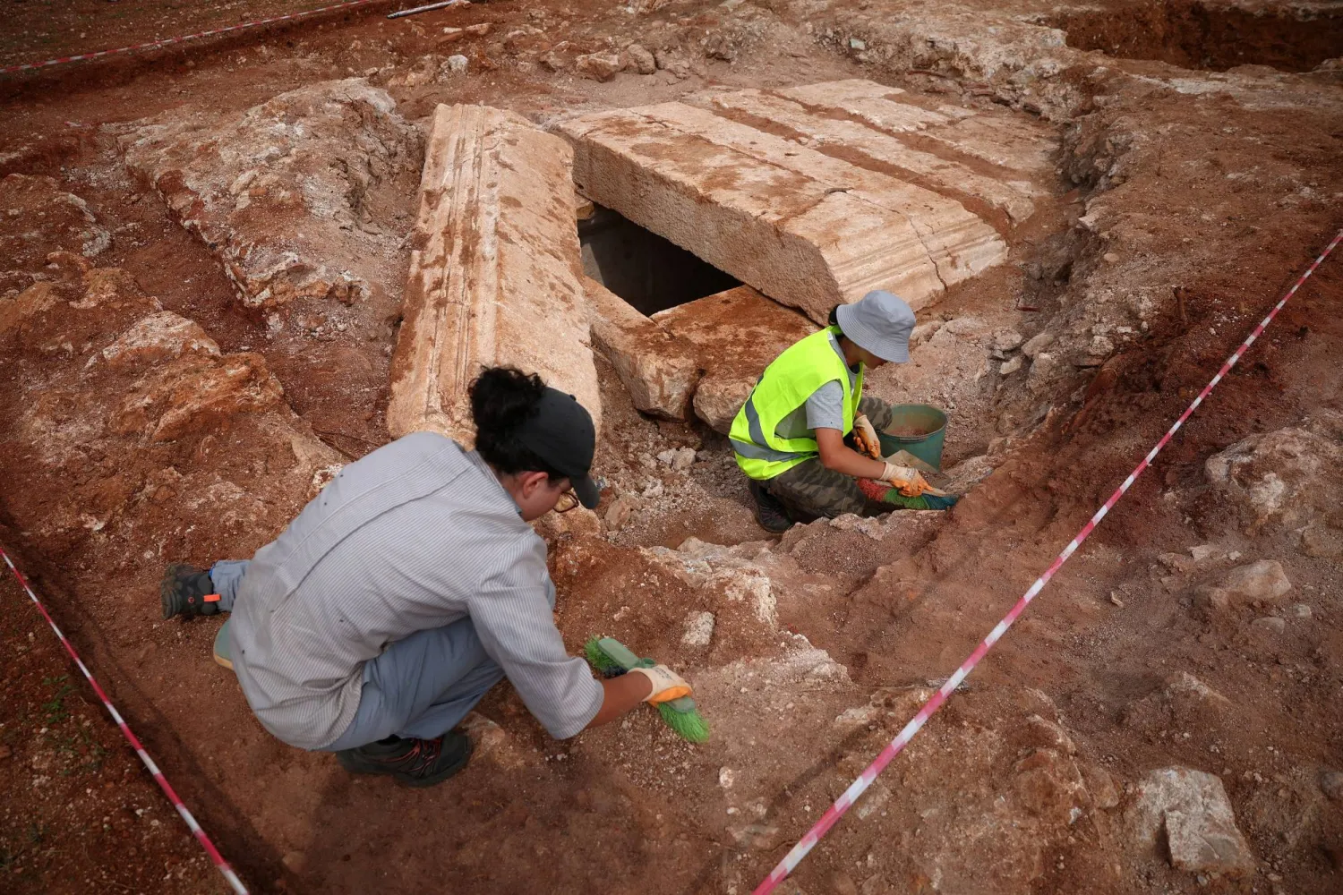 Archaeologists work on Albania's first discovered monumental tomb, which they suggest may be a mausoleum, dated to the Roman period III–IV century AD, in Strikcan, Albania, September 4, 2025. REUTERS/Florion Goga