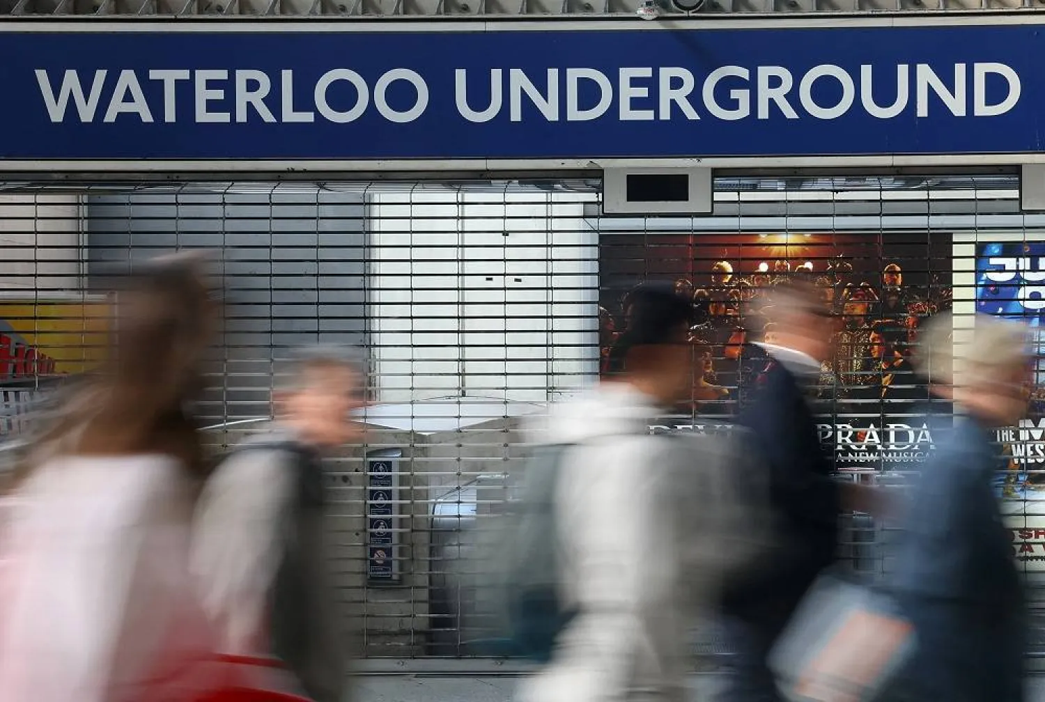 Travellers walk past a closed London Underground entrance during the morning rush hour, as London Tube rail strikes continue, at Waterloo Station in London, Britain, September 8, 2025. (Reuters)