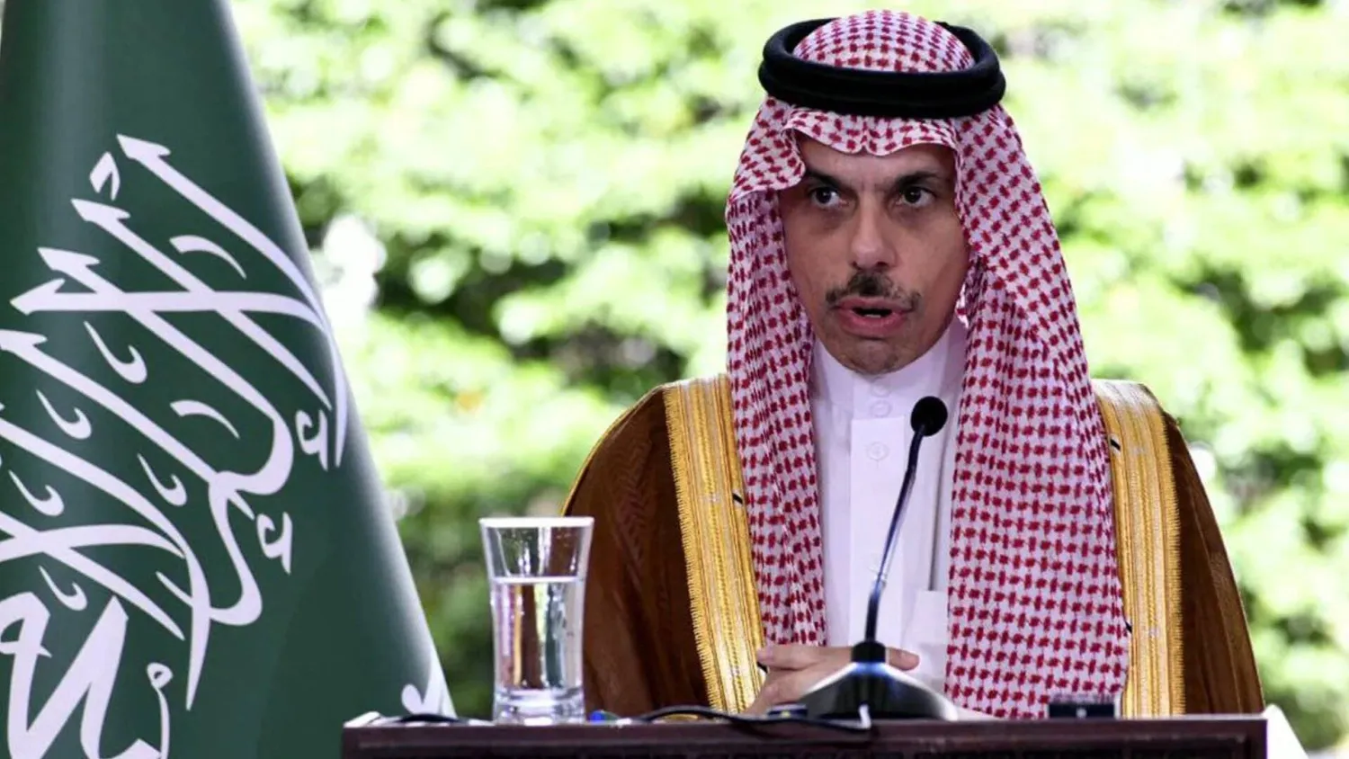 Saudi Arabia's Foreign Minister Prince Faisal bin Farhan bin Abdullah gives a press conference with Syria's interim foreign minister in Damascus on May 31, 2025. (SANA/AFP)