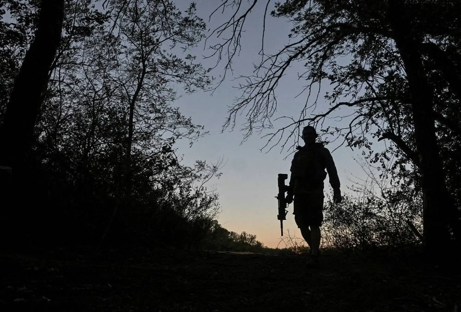A serviceman of the 141st Separate Mechanized Brigade of the Ukrainian Armed Forces walks at a position near a front line, amid Russia's attack on Ukraine, in Donetsk region, Ukraine September 3, 2025. (Reuters)  