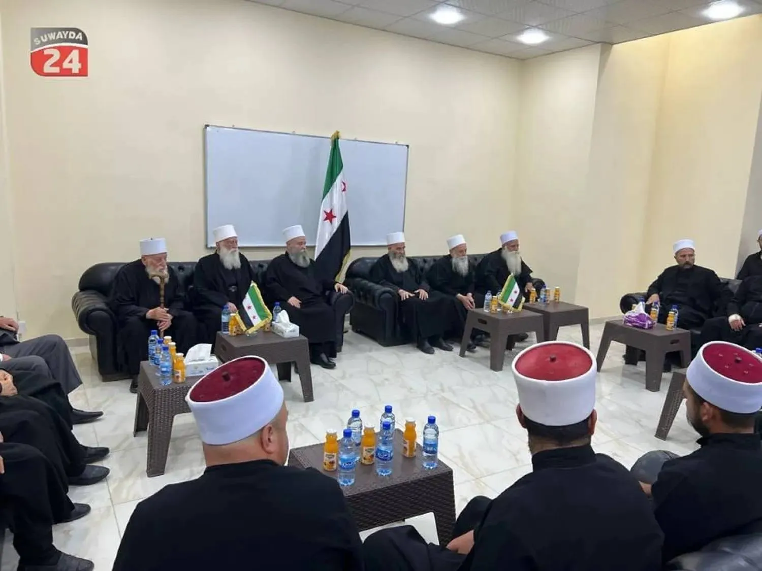 A delegation of Sweida Druze elders visits Daraya near Damascus in May. (Suwayda 24)