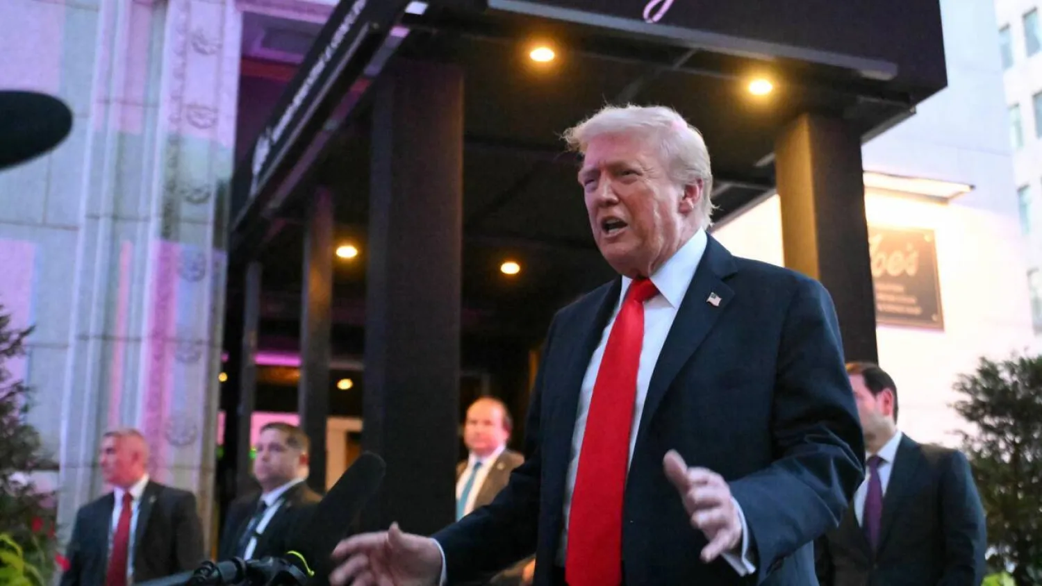 US President Donald Trump speaks to reporters outside the restaurant Joe’s Seafood, Prime Steak & Stone Crab in Washington, DC. SAUL LOEB / AFP
