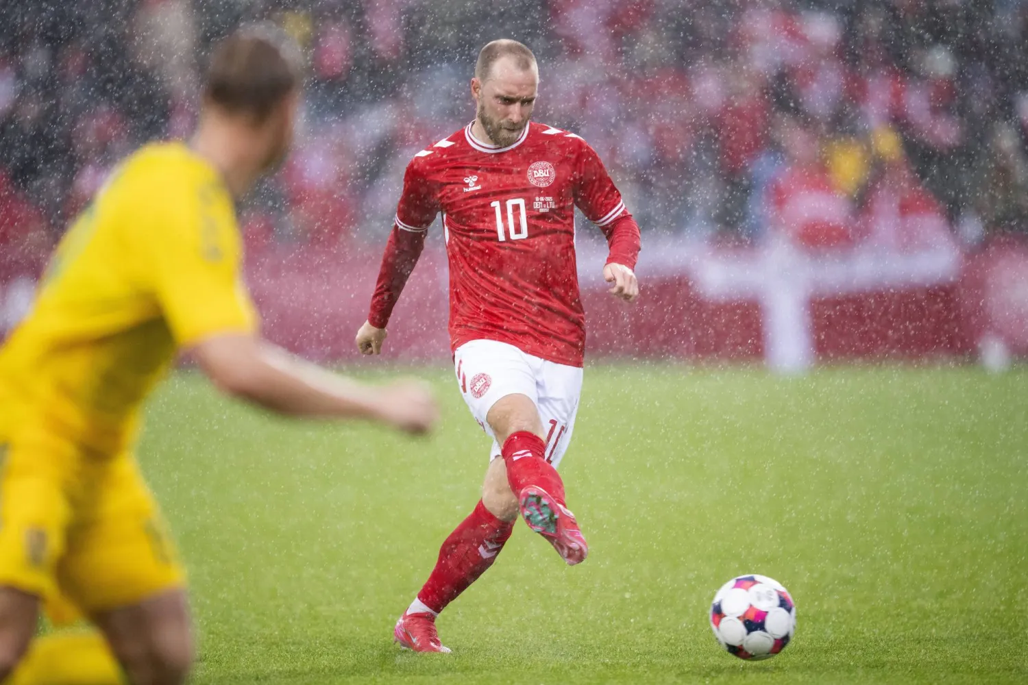 FILE - Denmark's Christian Eriksen passes the ball during an international friendly soccer match against Lithuania at Odense Stadium, Denmark, June 10, 2025. (Bo Amstrup/Ritzau Scanpix via AP, File)
