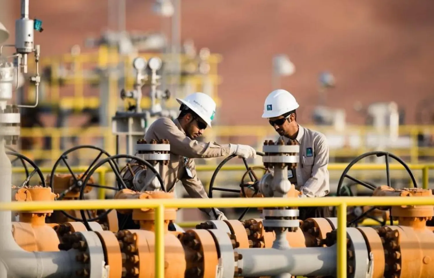 Workers are seen at a Saudi Aramco facility. (SPA)
