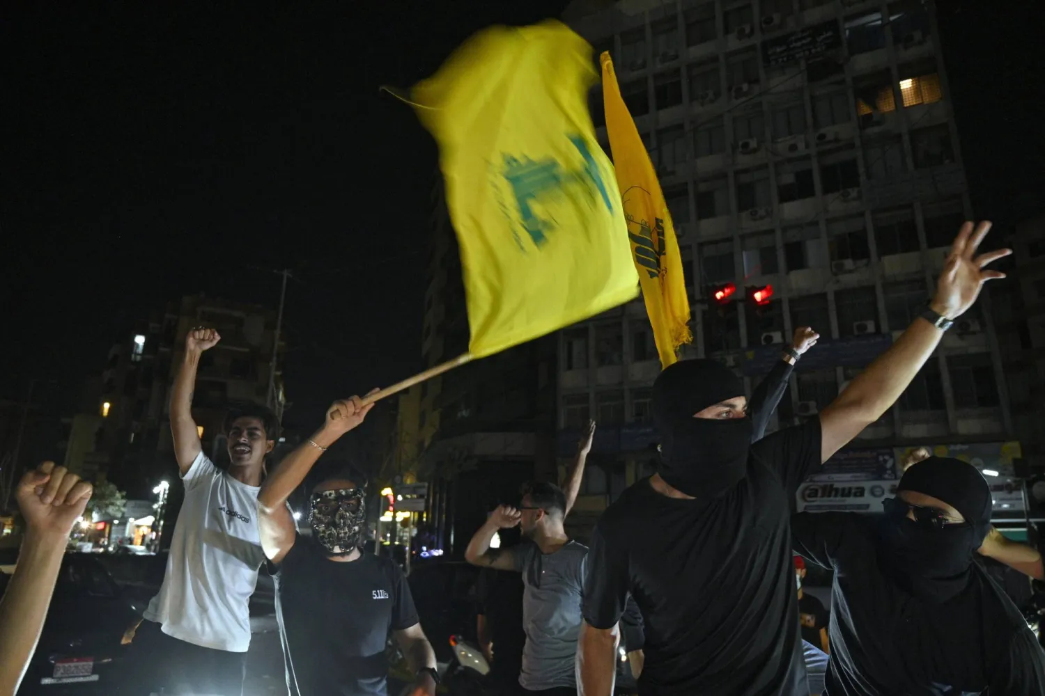 Supporters wave Hezbollah flags in a southern suburb of Beirut, Lebanon, 05 September 2025. EPA/WAEL HAMZEH