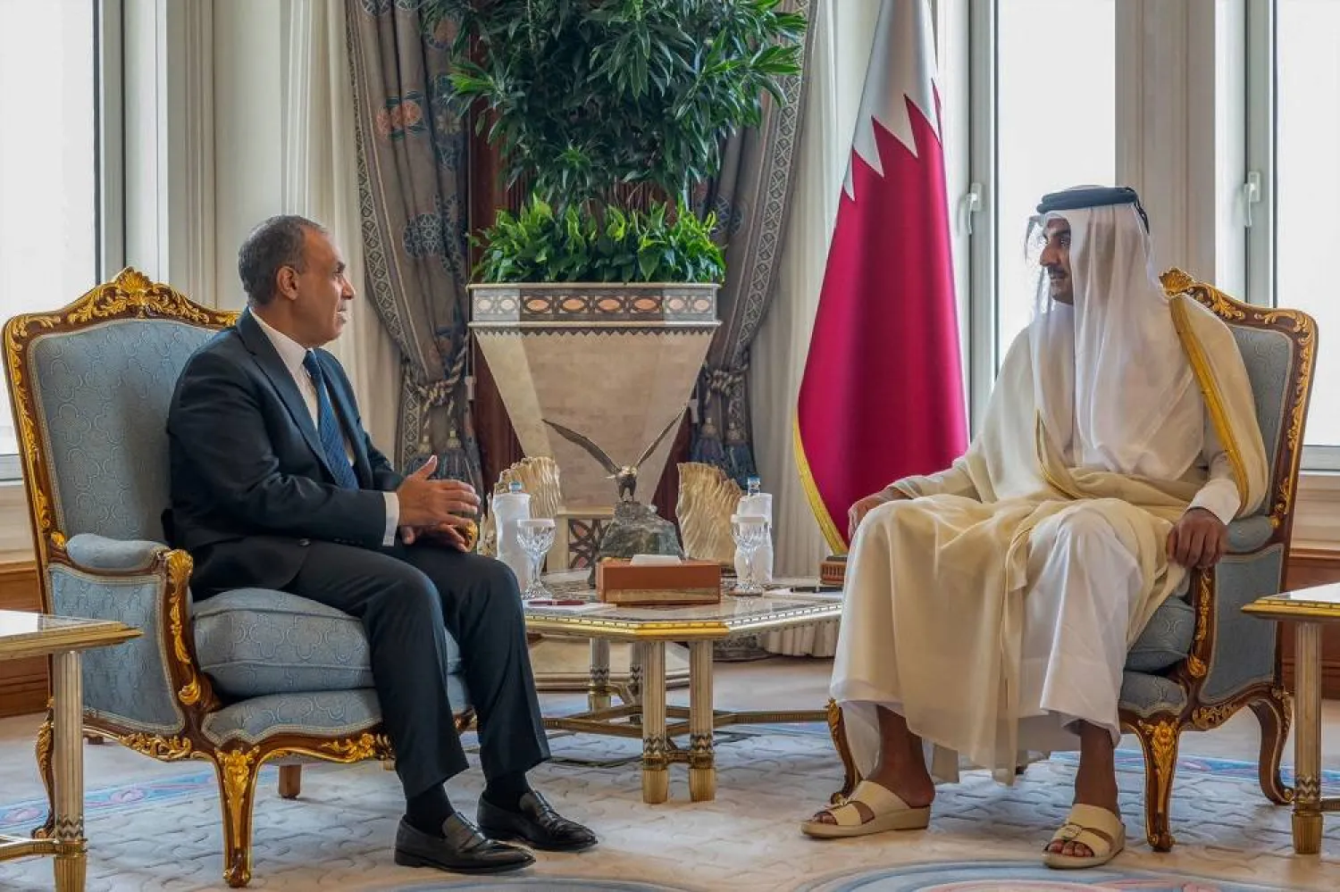 This handout picture made available by the Qatar Amiri Diwan shows Qatar's Amir Sheikh Tamim bin Hamad Al Thani receiving Egypt's Foreign Minister Badr Abdelatty in Doha on September 11, 2025. (Qatar Amiri Diwan / AFP) 
