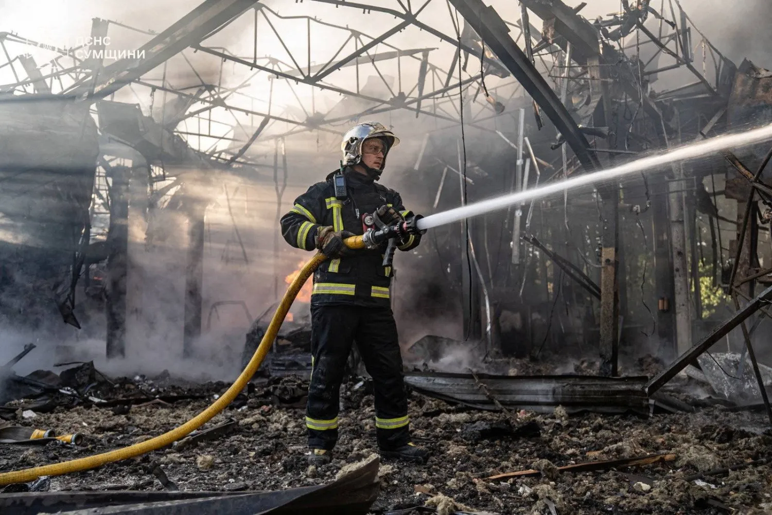 A firefighter works at the site of a Russian drone strike, amid Russia's attack on Ukraine, in Sumy, Ukraine, in this handout picture released September 12, 2025. Press service of the State Emergency Service of Ukraine in Sumy region/Handout via REUTERS 