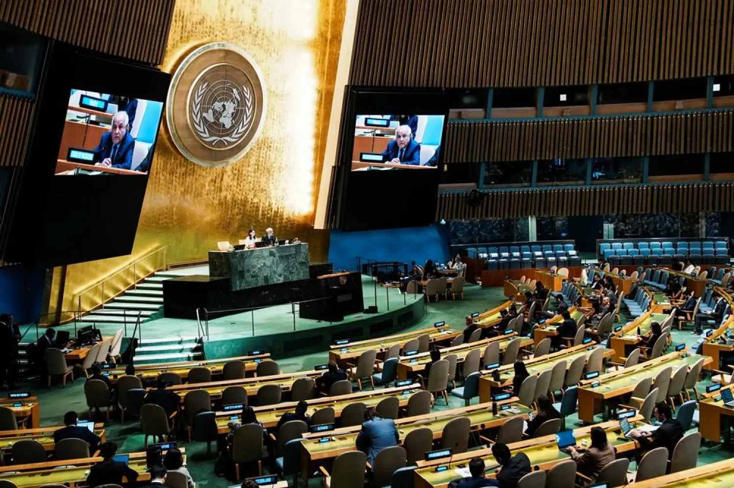 Riyad Mansour, Palestinian Permanent Observer to the United Nations, on screens as he addresses delegates after the United Nations General Assembly vote on the Question of Palestine and the Implementation of the Two-State Solution, at UN headquarters in New York City, US, September 12, 2025. (Reuters) 