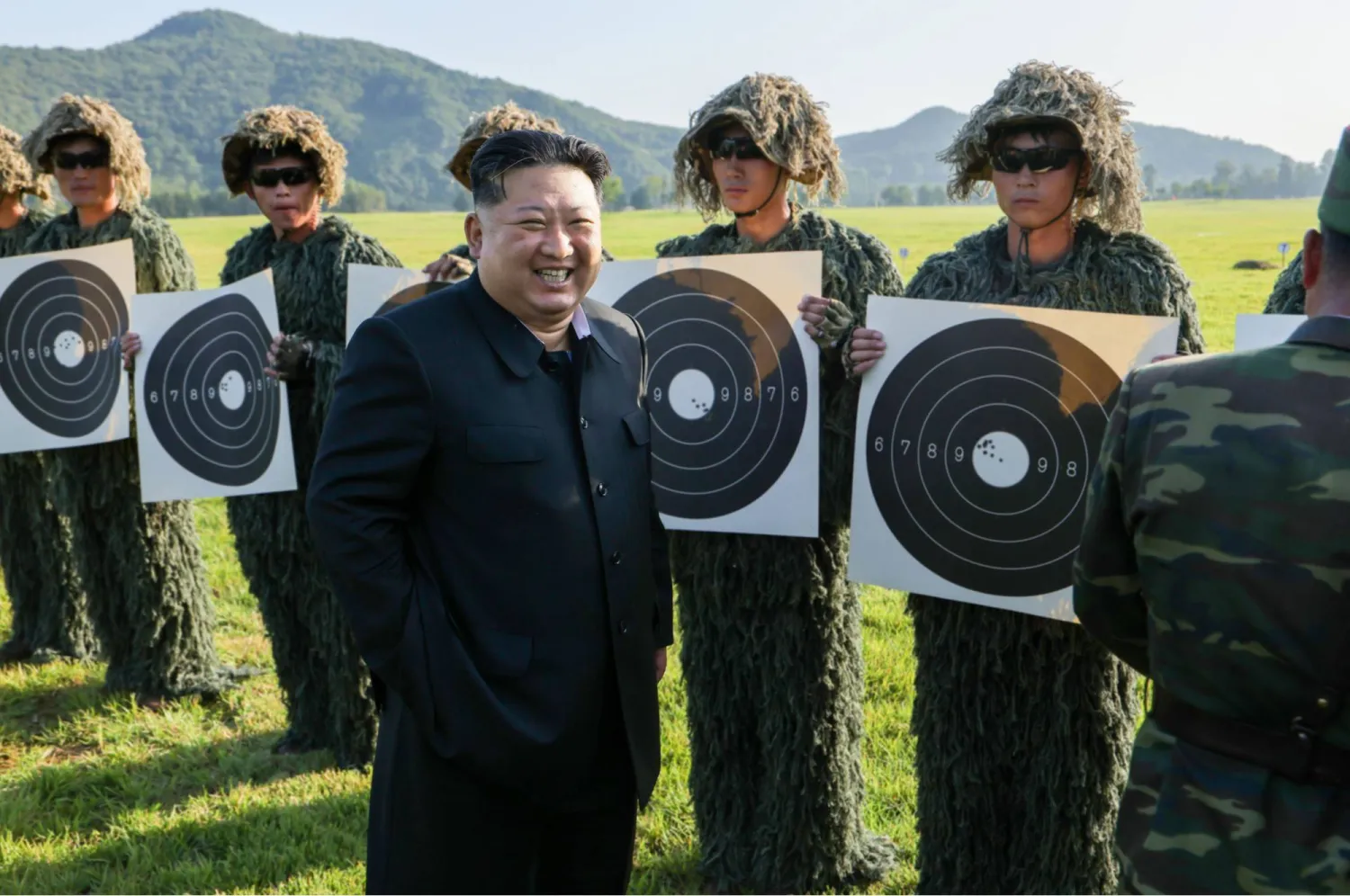 HANDOUT - 13 September 2025, North Korea, --: A photo released by the North Korean State News Agency (KCNA) on September 12, 2025 shows North Korean leader Kim Jong-un (C) overseeing a shooting contest between troops of the sniper subunits belonging to the metropolitan garrison command and the special mobile force of the central security organ. Photo: -/KCNA/KNS/dpa 