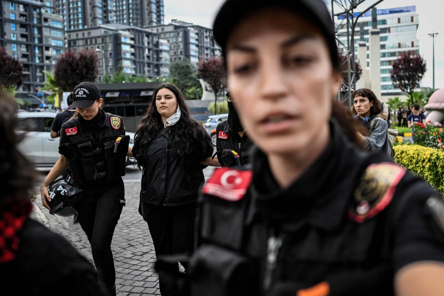 Turkish anti-riot police officers detain a protester during a demonstration near the Istanbul Provence headquarters of Türkiye's main opposition party "Republican People's Party" (CHP), on September 8, 2025, in Istanbul. (Photo by KEMAL ASLAN / AFP)