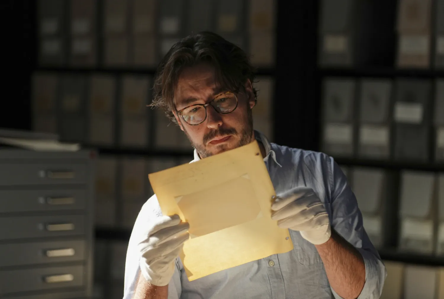 University of Victoria postdoctoral fellow Nathaniel Brunt views an image from a collection of photos of the Yazidi people in their northern Iraq homeland in the 1930s, during an interview at the Penn Museum Archives in Philadelphia, Aug. 27, 2025. (AP Photo/Matt Rourke)