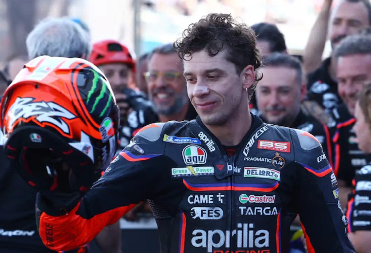 MotoGP - Hungarian Grand Prix - Balaton Park Circuit, Balatonfokajart, Hungary - August 24, 2025 Aprilia Racing's Marco Bezzecchi celebrates finishing third in the MotoGP race REUTERS/Bernadett Szabo/File Photo