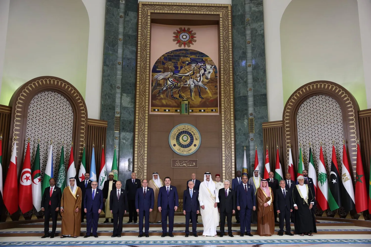 Leaders pose for a family photo at the Arab summit in Baghdad in May. (Arab League)