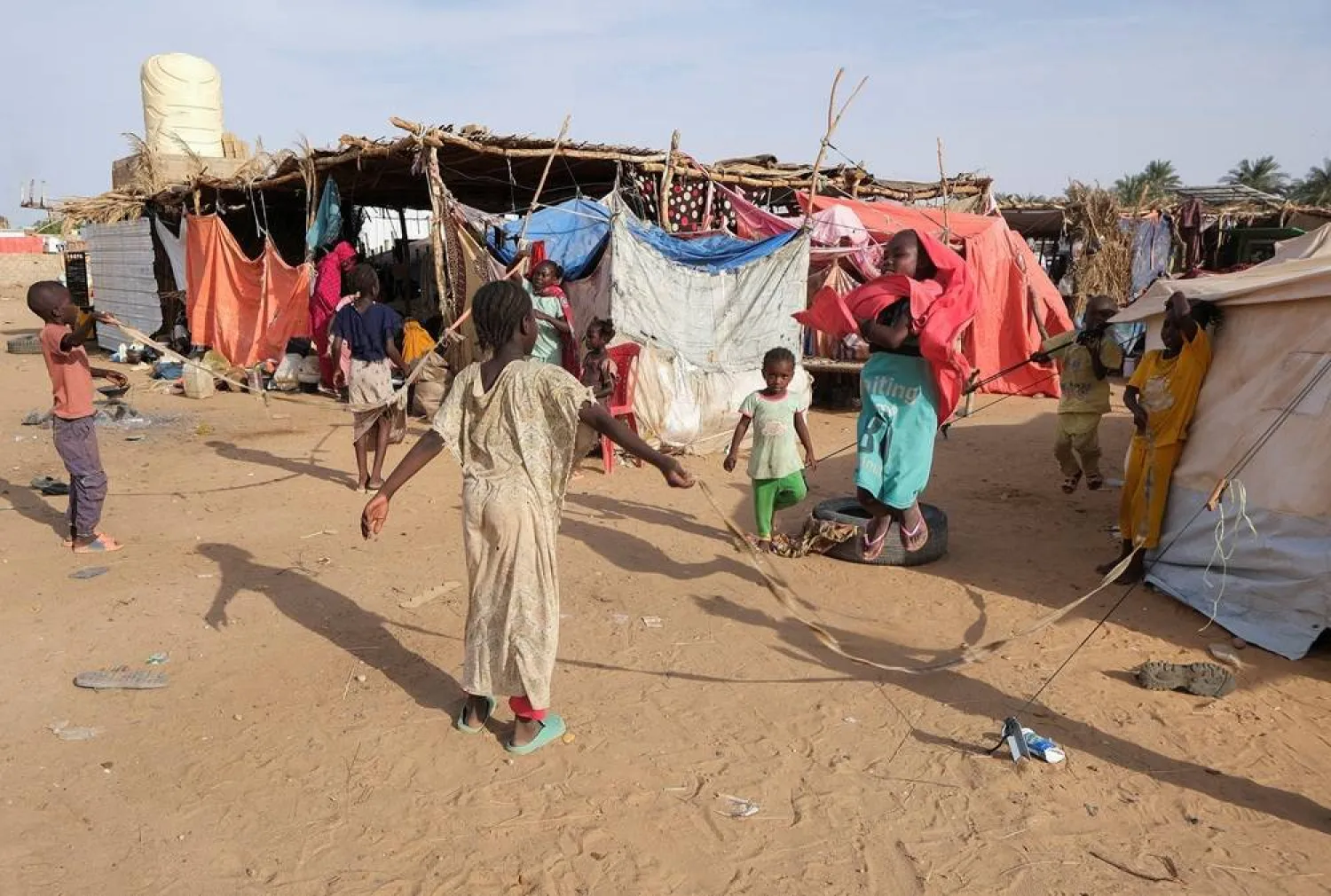 Displaced Sudanese girls, who fled intense fighting in al-Fashir, play at a displacement camp, as the humanitarian situation deteriorates amid the ongoing conflict between the paramilitary Rapid Support Forces (RSF) and the Sudanese army, in Al Dabba, Sudan, September 6, 2025. (Reuters)