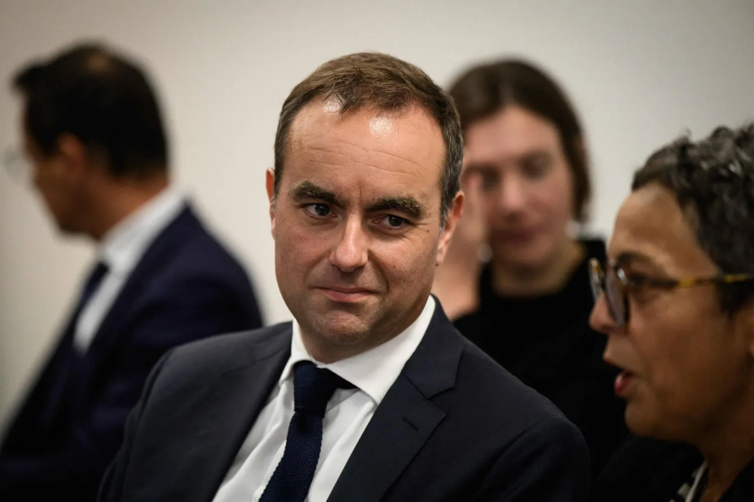 Newly appointed France's Prime Minister Sebastien Lecornu attends a meeting as he visits the departmental health center in Macon, central eastern France, on September 13, 2025. (Photo by JEFF PACHOUD / AFP)